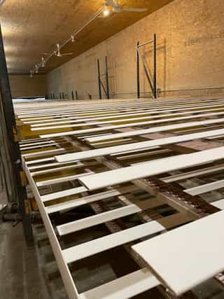 Shutter drying racks in Americana factory